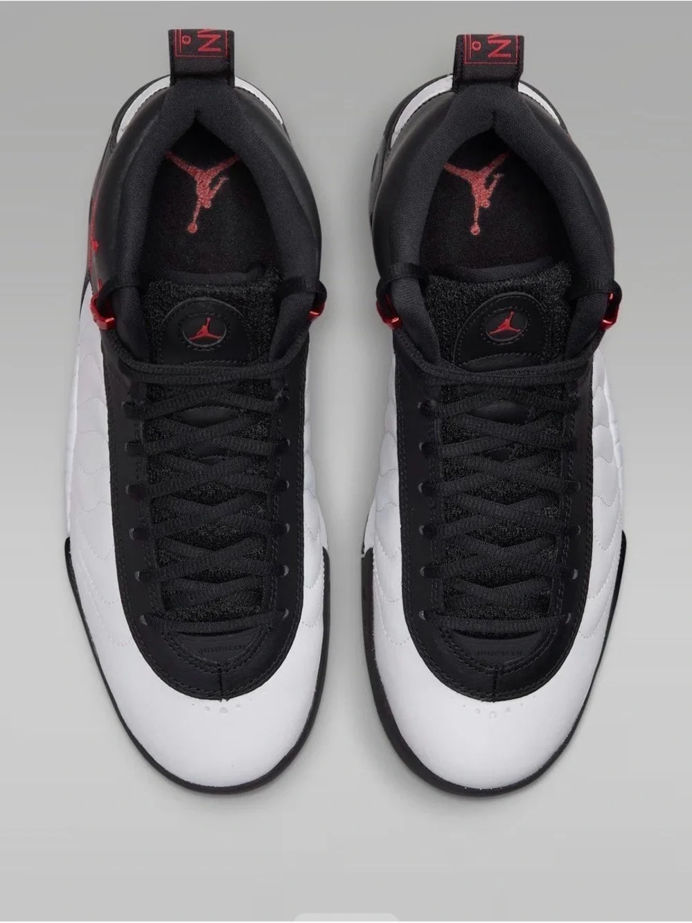 Jordan Men’s Mid Sneaker - Black/White/Red New. Original box is broken.